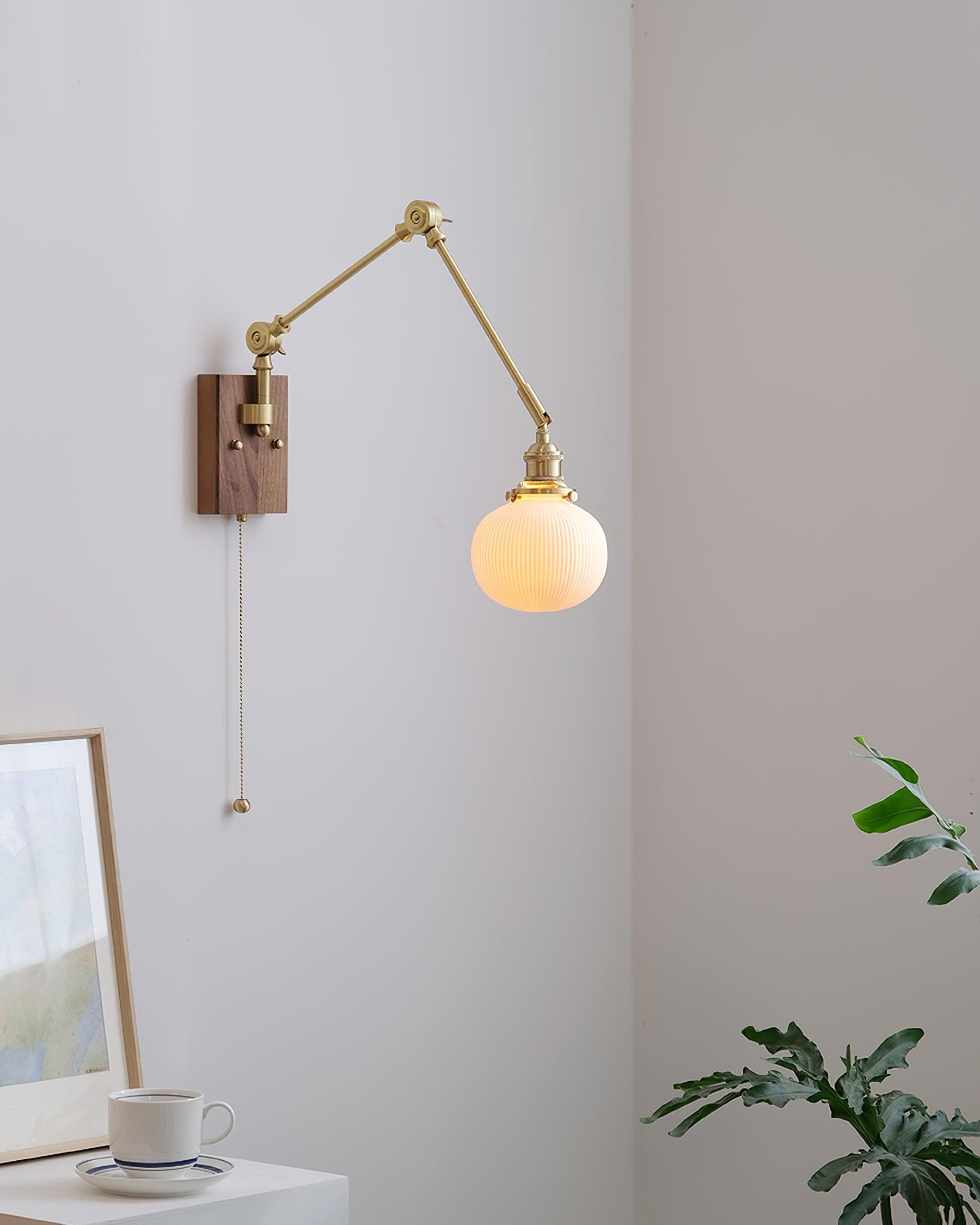 RAVENSCROFT ADJUSTABLE SWINGING WALL SCONCE