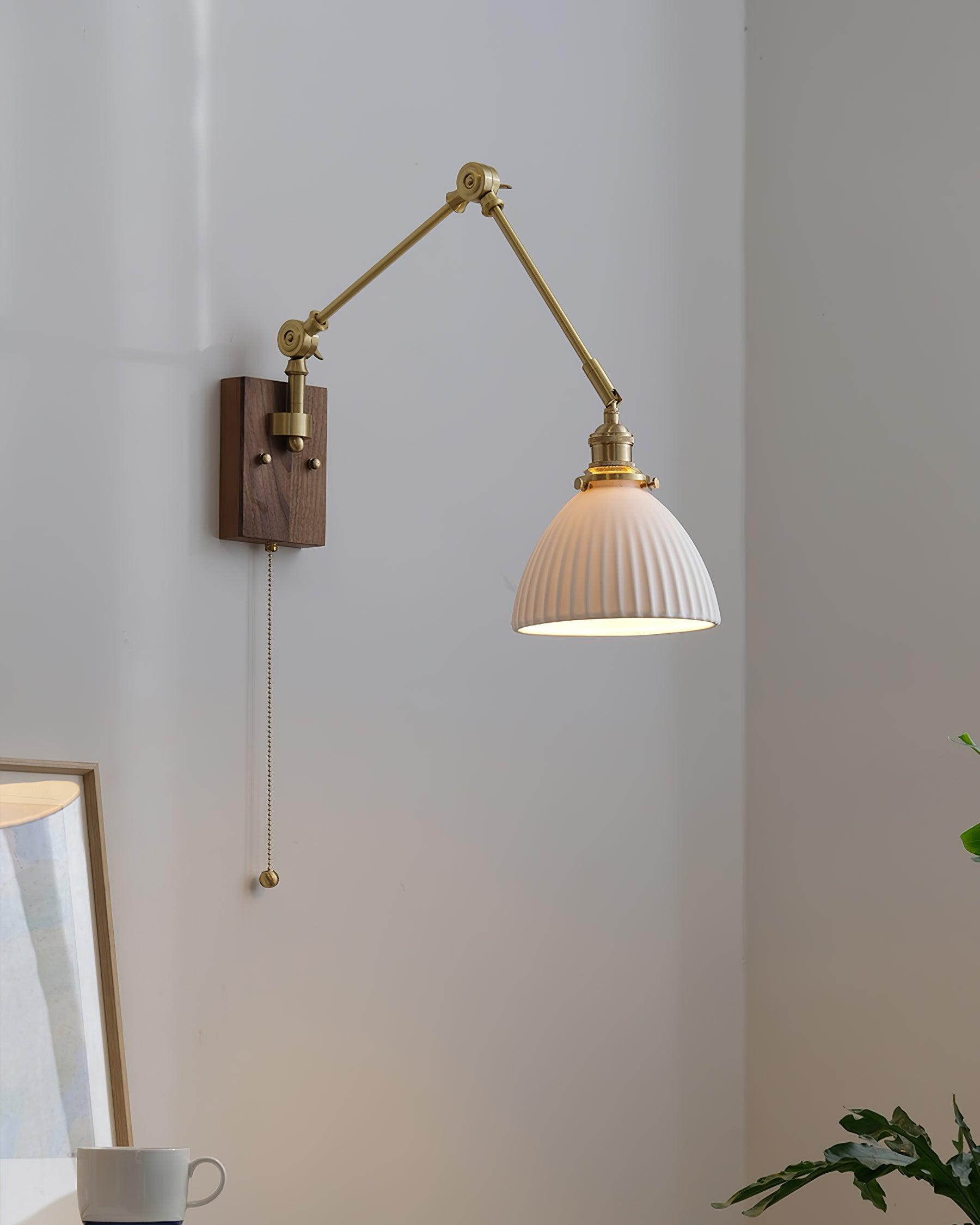 RAVENSCROFT ADJUSTABLE SWINGING WALL SCONCE