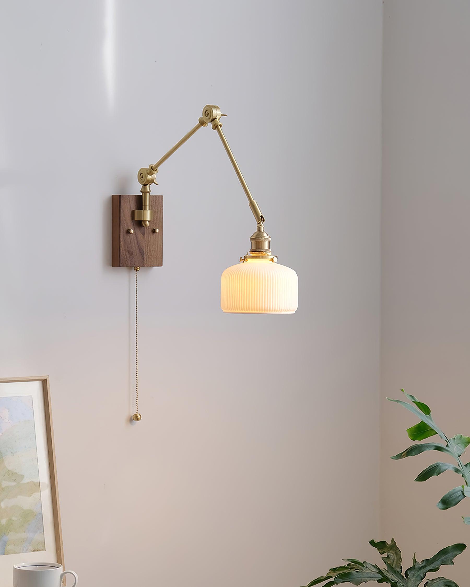 RAVENSCROFT ADJUSTABLE SWINGING WALL SCONCE