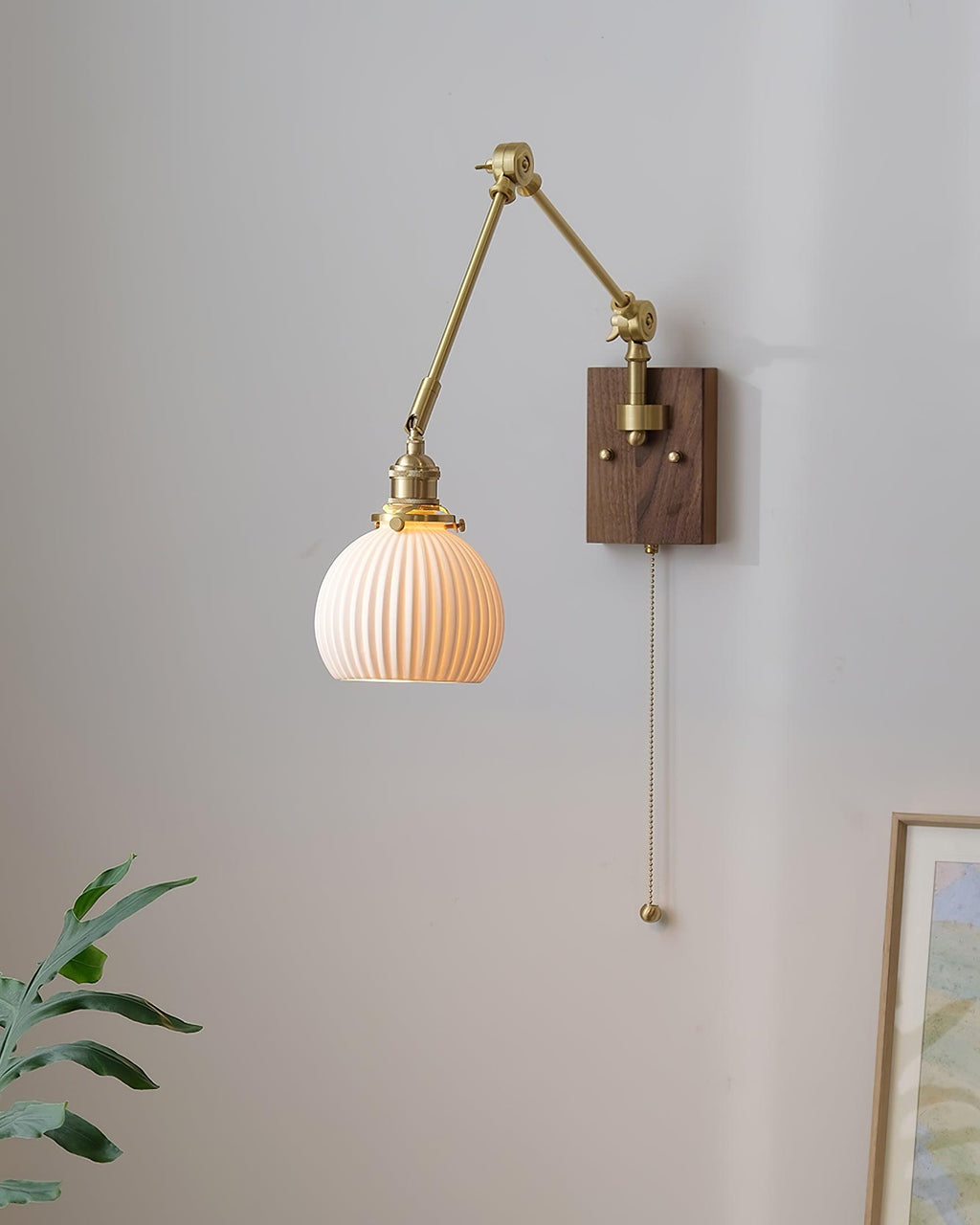 RAVENSCROFT ADJUSTABLE SWINGING WALL SCONCE