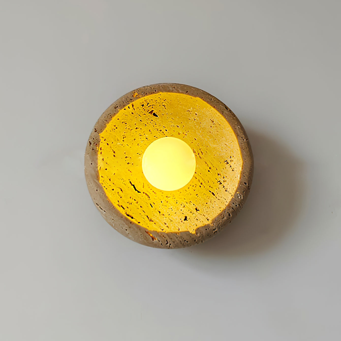 RAVENHALL TRAVERTINE ILLUMINATED WALL SCONCE