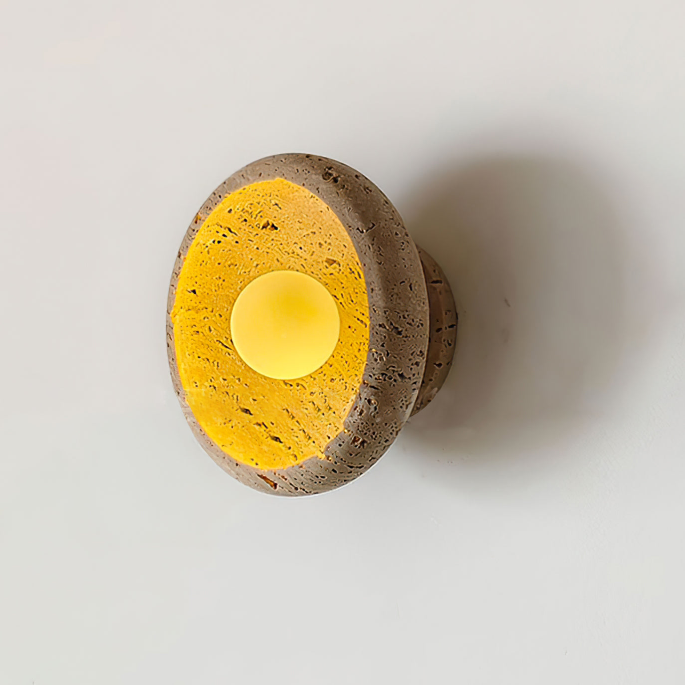 RAVENHALL TRAVERTINE ILLUMINATED WALL SCONCE