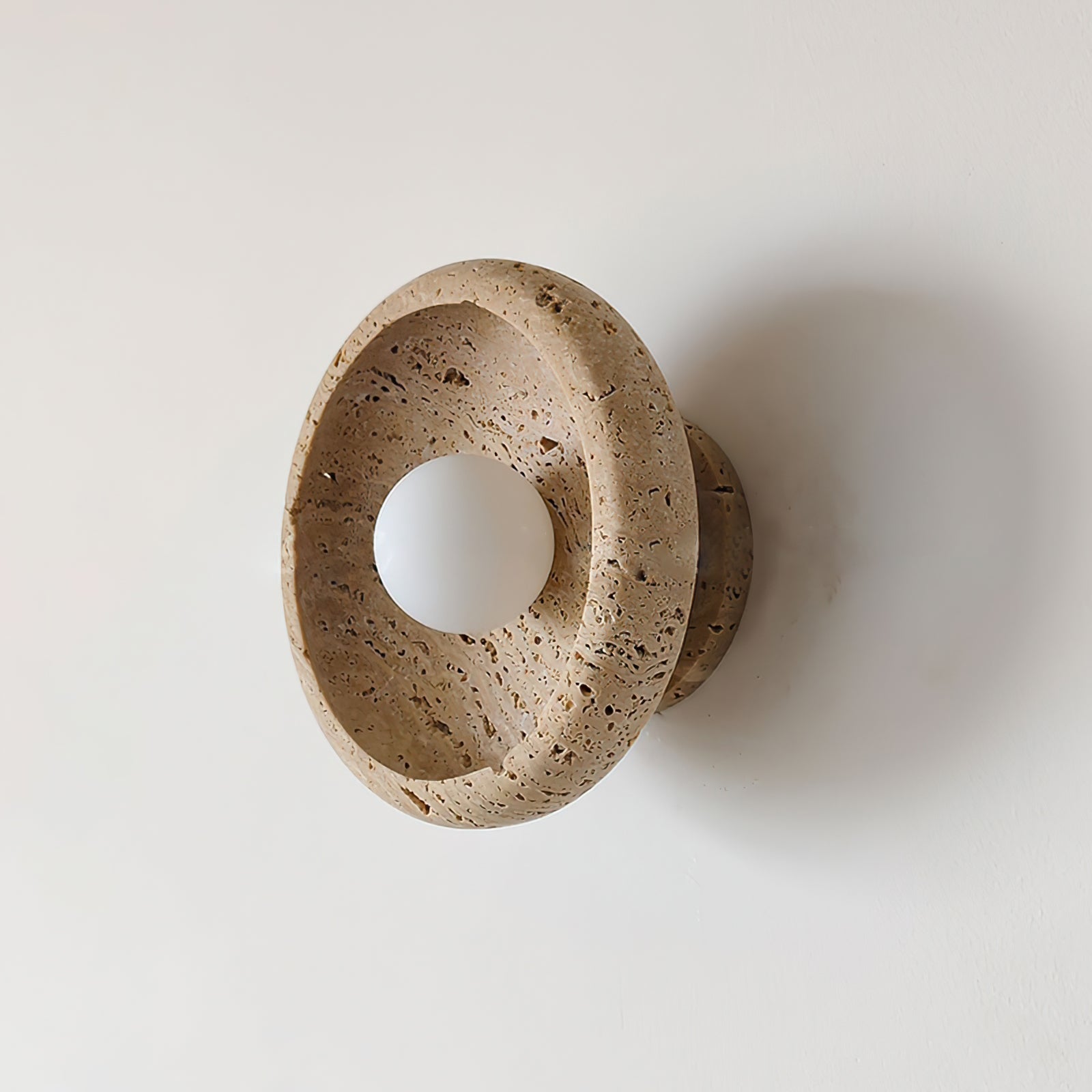 RAVENHALL TRAVERTINE ILLUMINATED WALL SCONCE