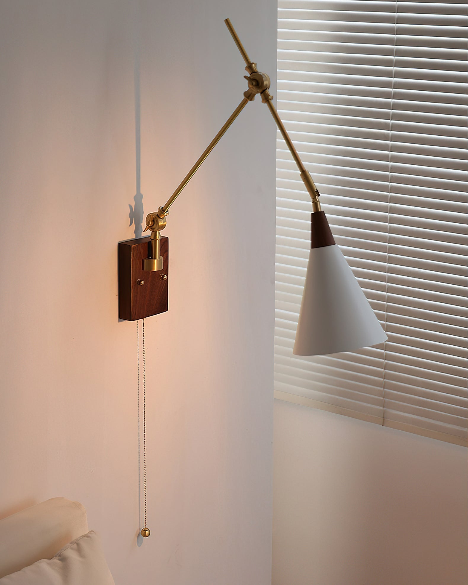 RAVENHALL ADJUSTABLE ARM WALL LIGHT