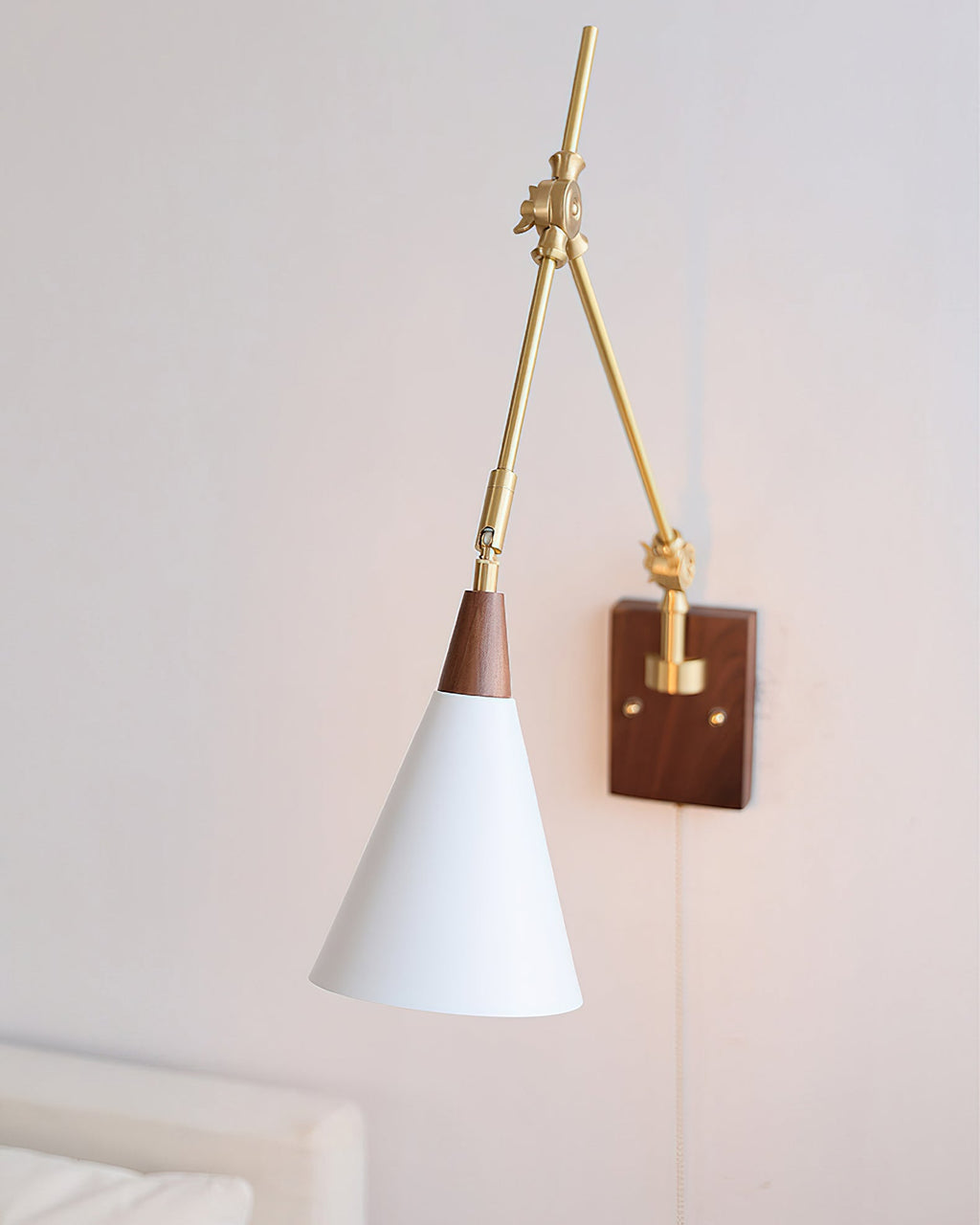 RAVENHALL ADJUSTABLE ARM WALL LIGHT