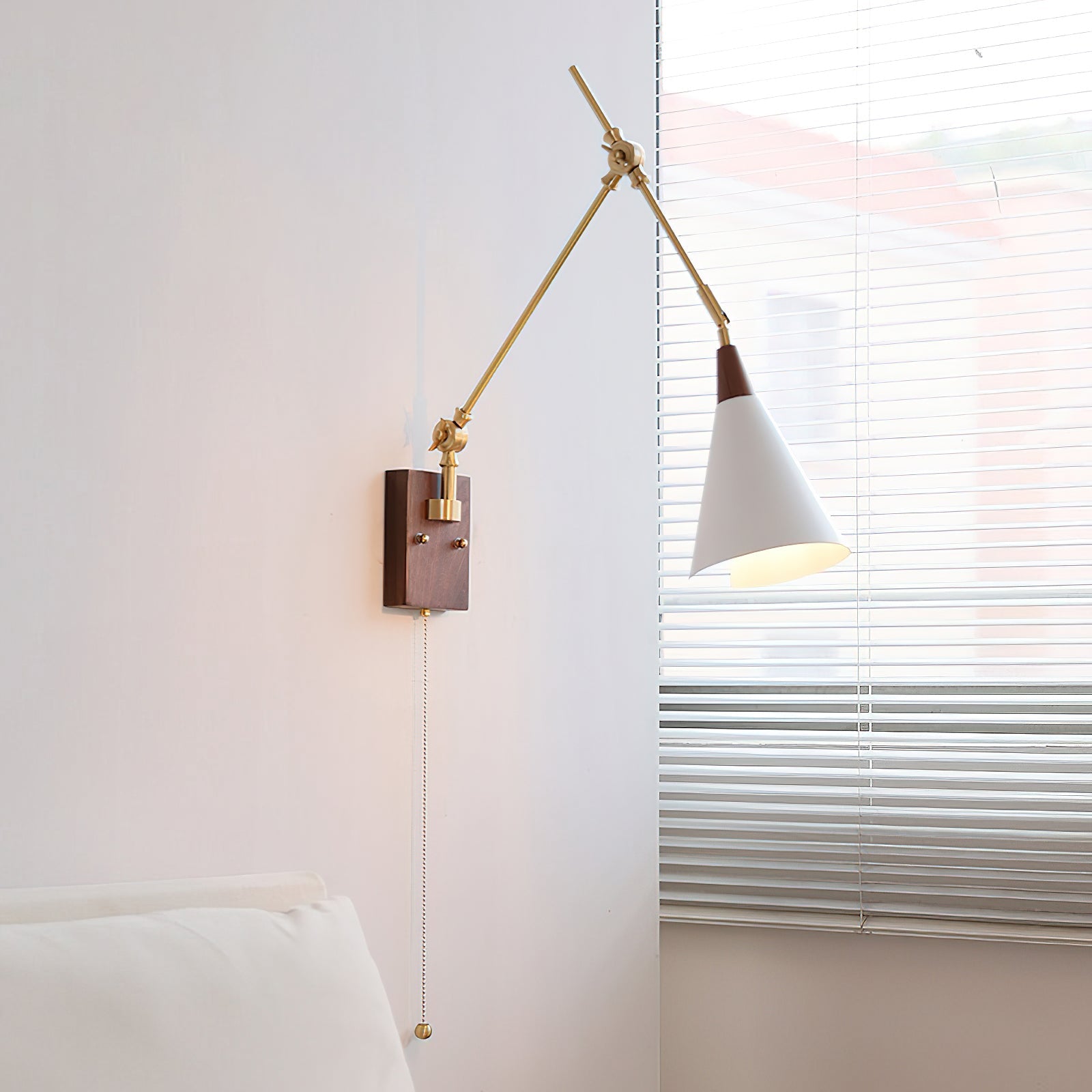 RAVENHALL ADJUSTABLE ARM WALL LIGHT