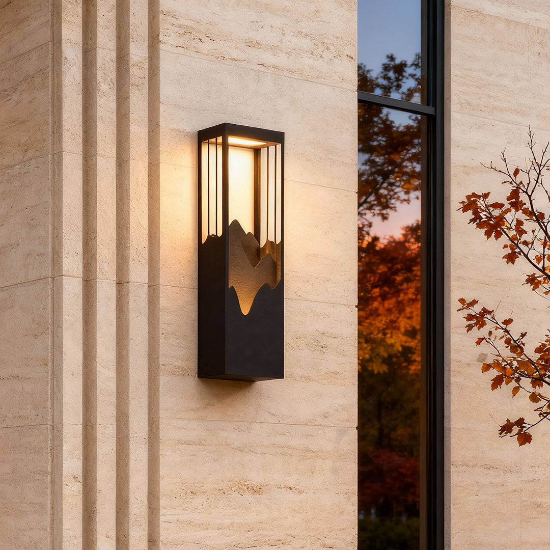 **HARTFIELD SOLAR-POWERED MOUNTAIN VIEW WALL LANTERN**  
Illuminate your outdoor spaces with this waterproof wall lamp featuring a stunning mountain scenery design. Equipped with up and down LED lighting, it enhances your porch or patio with a warm glow w