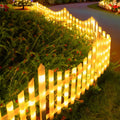 1. **WINSLOW WAVES GARDEN FENCE LANTERNS SET** - A charming collection of eight solar-powered LED lights designed in a graceful wave shape, perfect for illuminating your garden during the festive season.

2. **HARLEQUIN HORIZON SOLAR GLOW FENCE ACCENTS**
