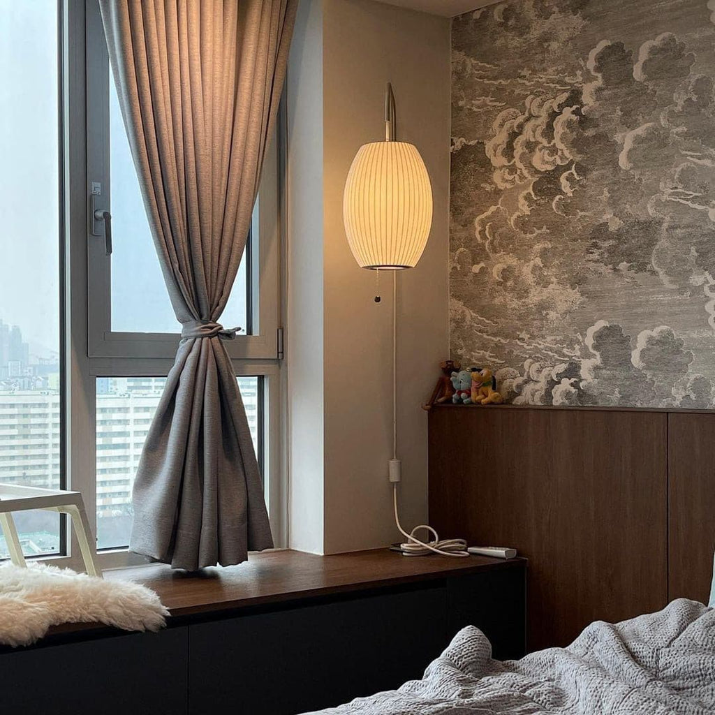 THISTLEWOOD GLOWING WALL SCONCE