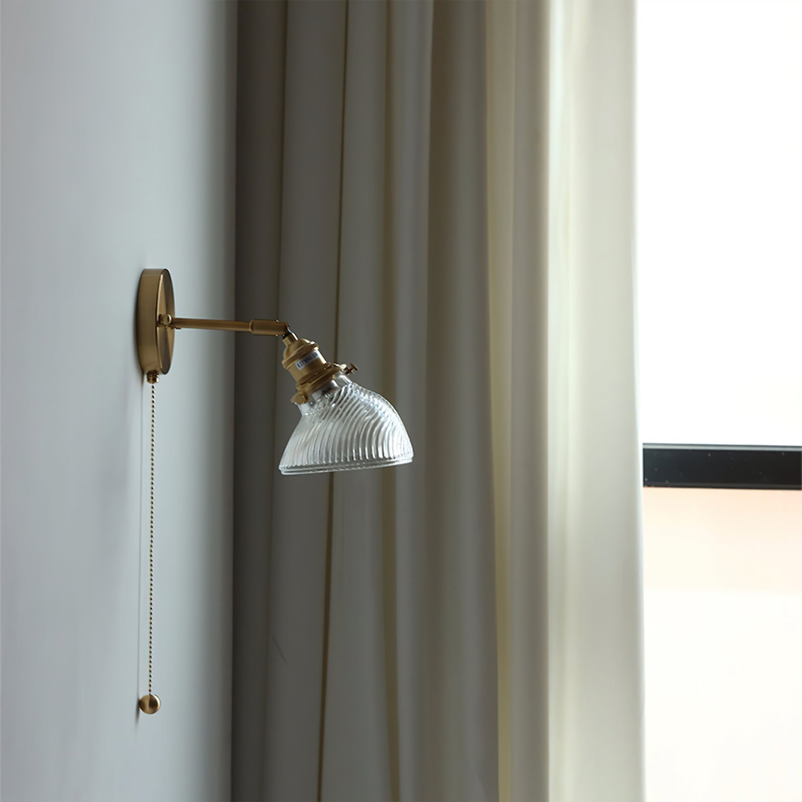 FENWICK GLOWING CRESCENT WALL SCONCE