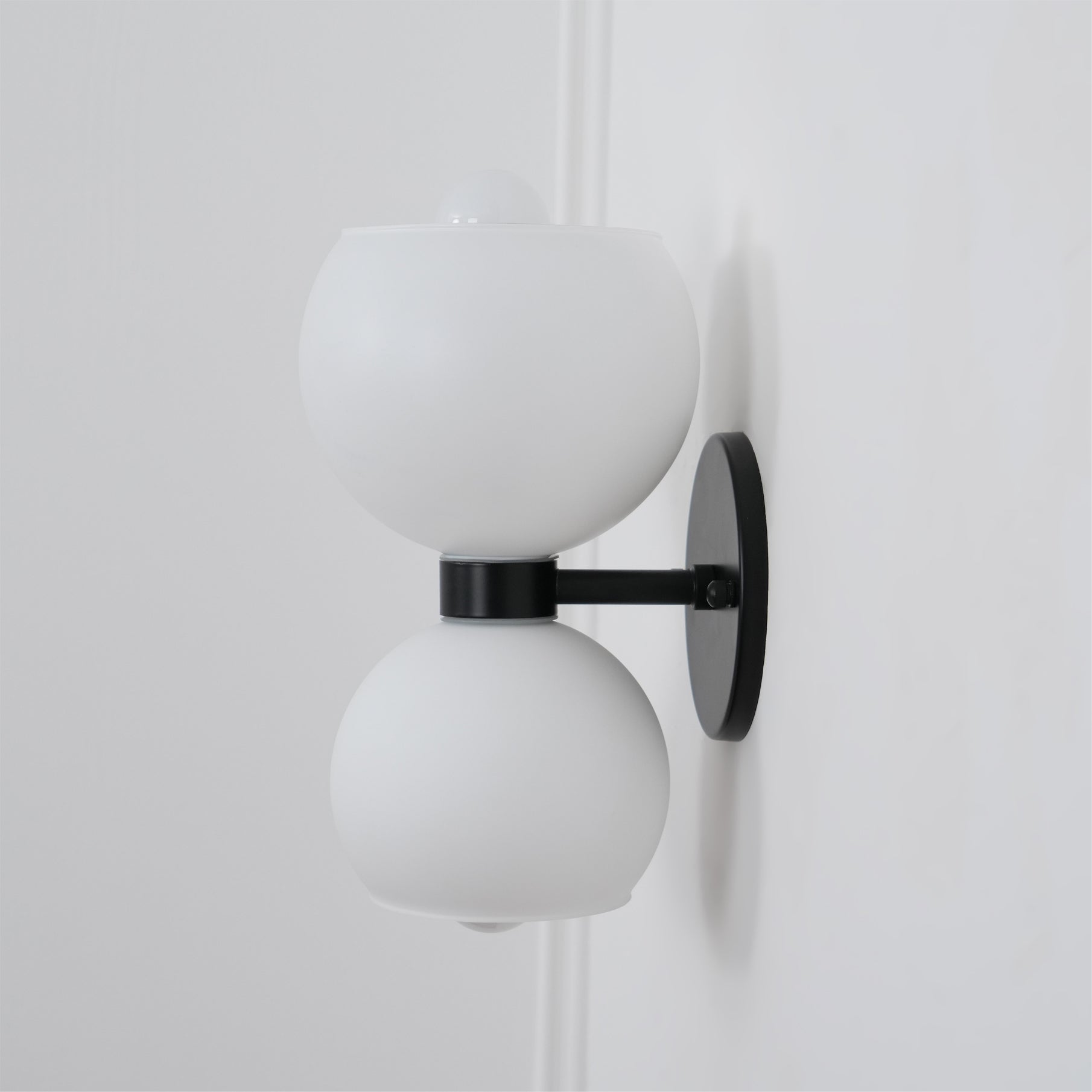 WINTHROP CIRCULAR IVORY GLASS BEDROOM SCONCE