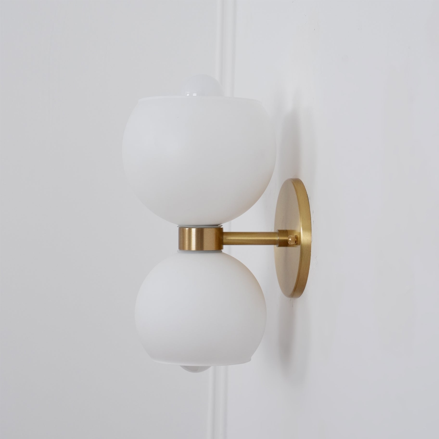 WINTHROP CIRCULAR IVORY GLASS BEDROOM SCONCE