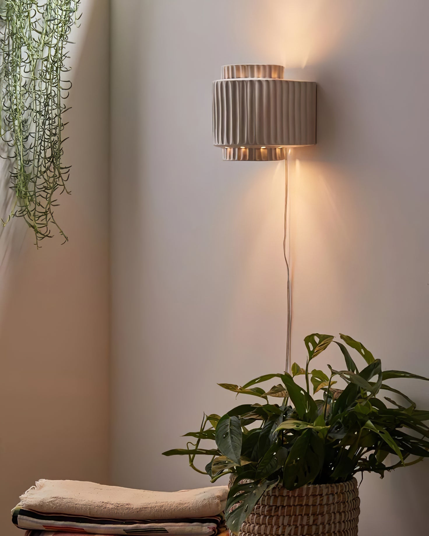 RAVENHALL ILLUMINATED WALL SCONCE