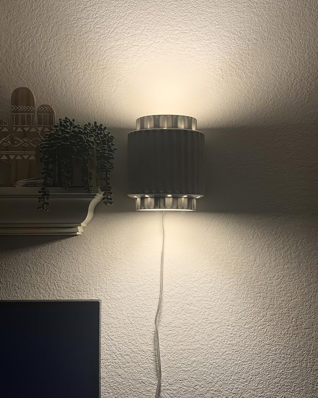 RAVENHALL ILLUMINATED WALL SCONCE