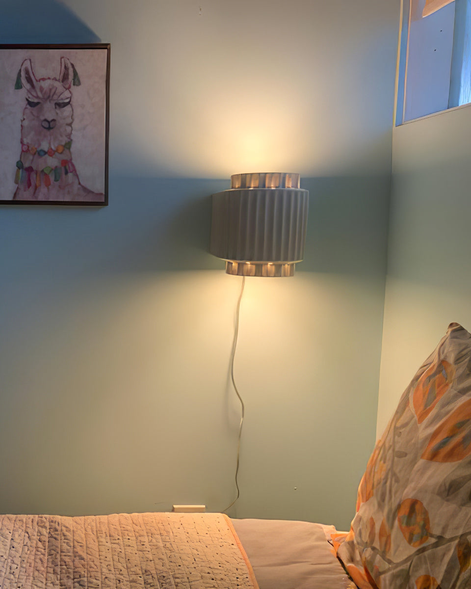 RAVENHALL ILLUMINATED WALL SCONCE