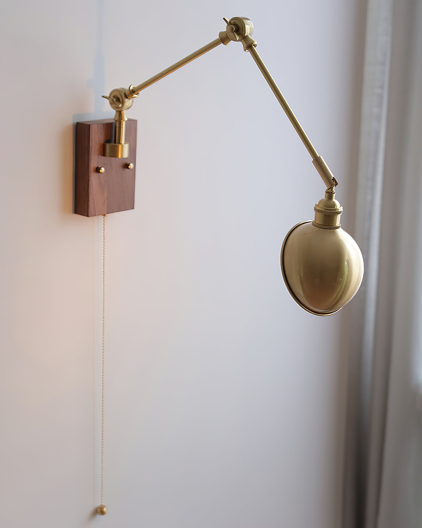 RAVENWOOD ADJUSTABLE SWINGING WALL LIGHT