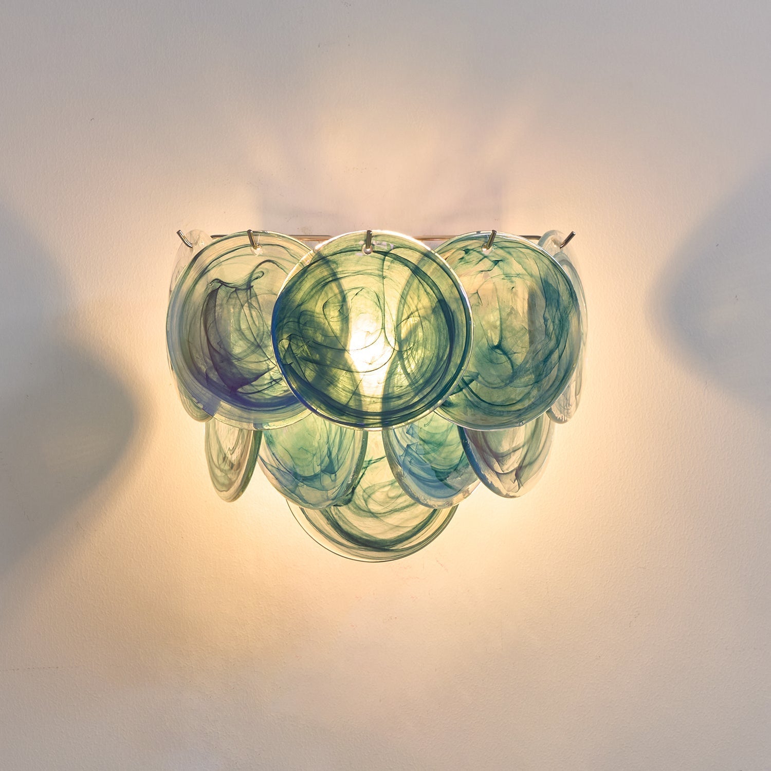 RAVENHALL CIRCULAR ILLUMINATION WALL SCONCE