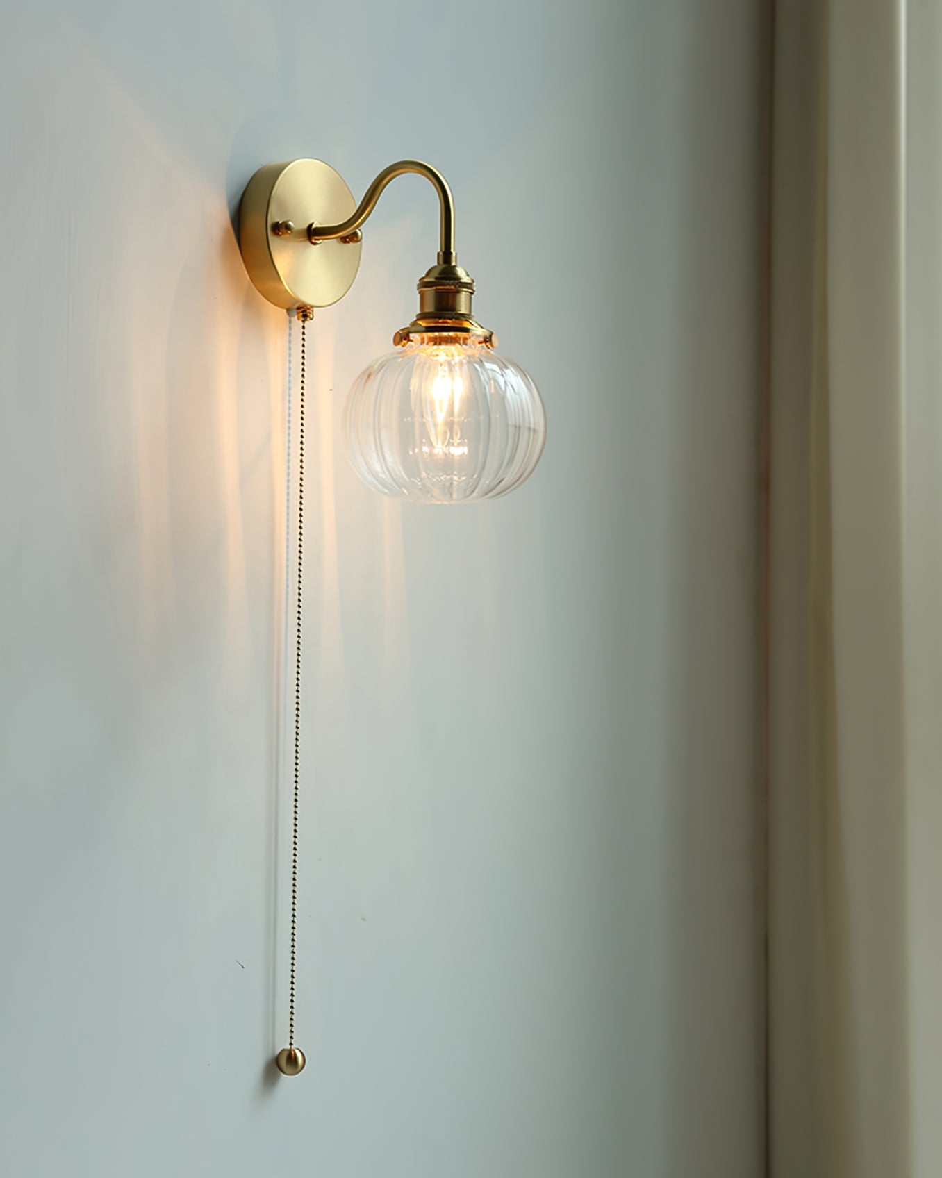 RAVENSHIRE ILLUMINATED GLASS SCONCE