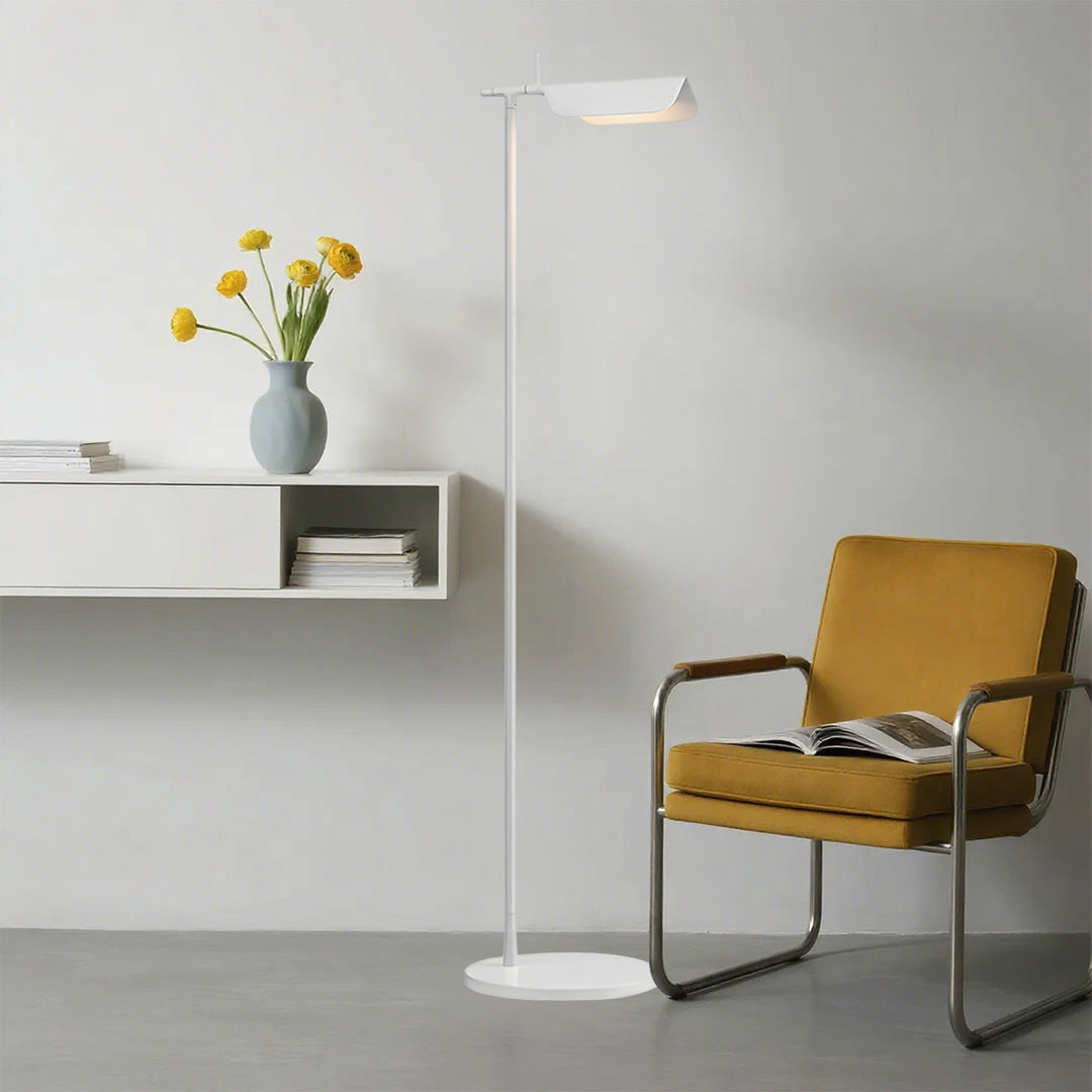 1. **LUMINAIRE VICTORIA ADJUSTABLE READING LAMP** - A sleek, dimmable LED floor lamp featuring a modern design, perfect for creating a cozy reading nook.

2. **PENROSE MODERN ILLUMINATOR** - A stylish dimmable LED floor lamp with a contemporary silhouette