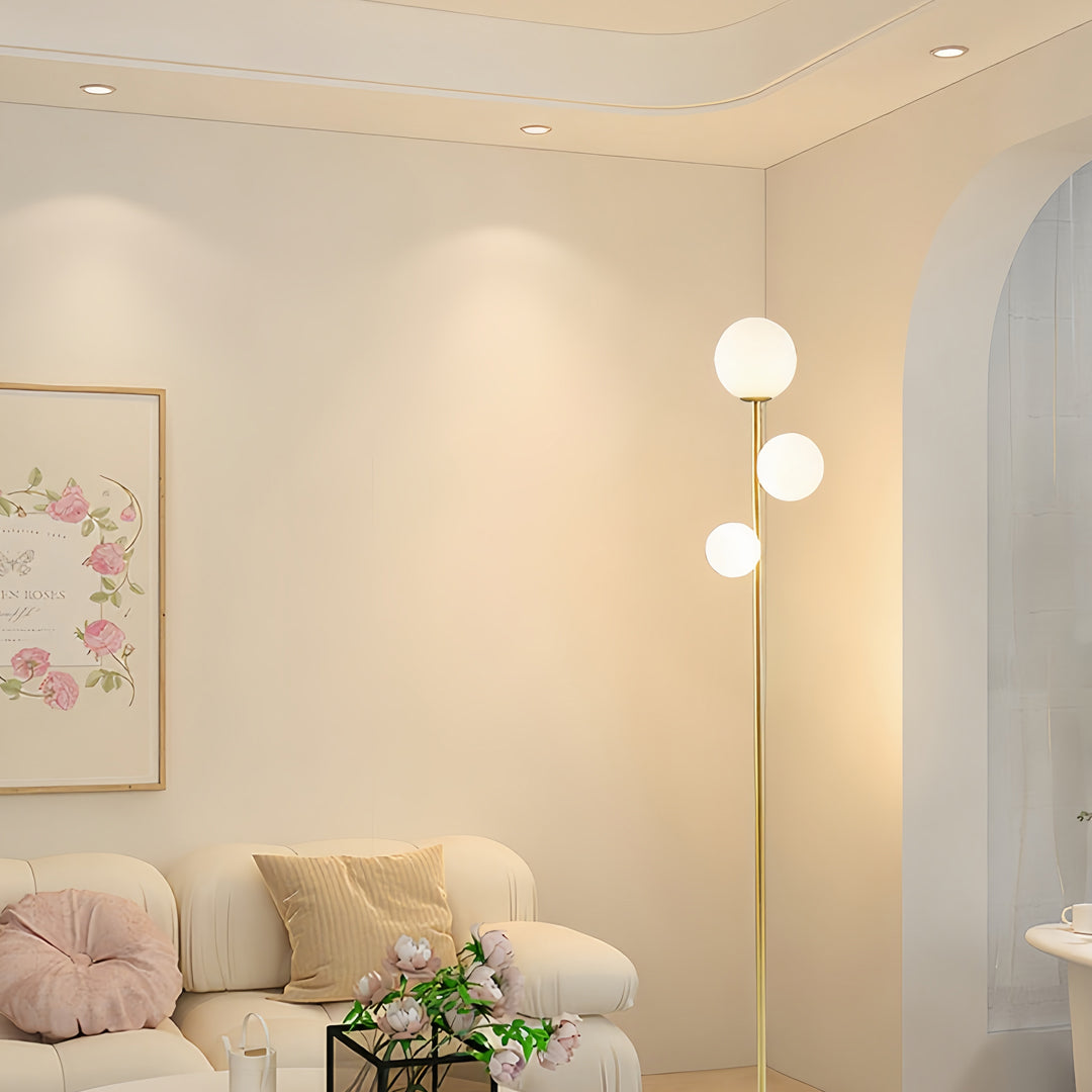 WINTHROP TRIO SPHERE FLOOR LIGHTING IN GILDED BLACK AND WHITE