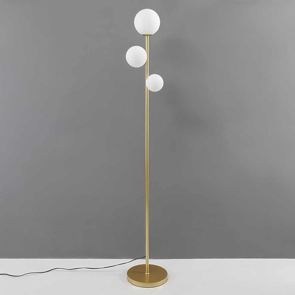 WINTHROP TRIO SPHERE FLOOR LIGHTING IN GILDED BLACK AND WHITE