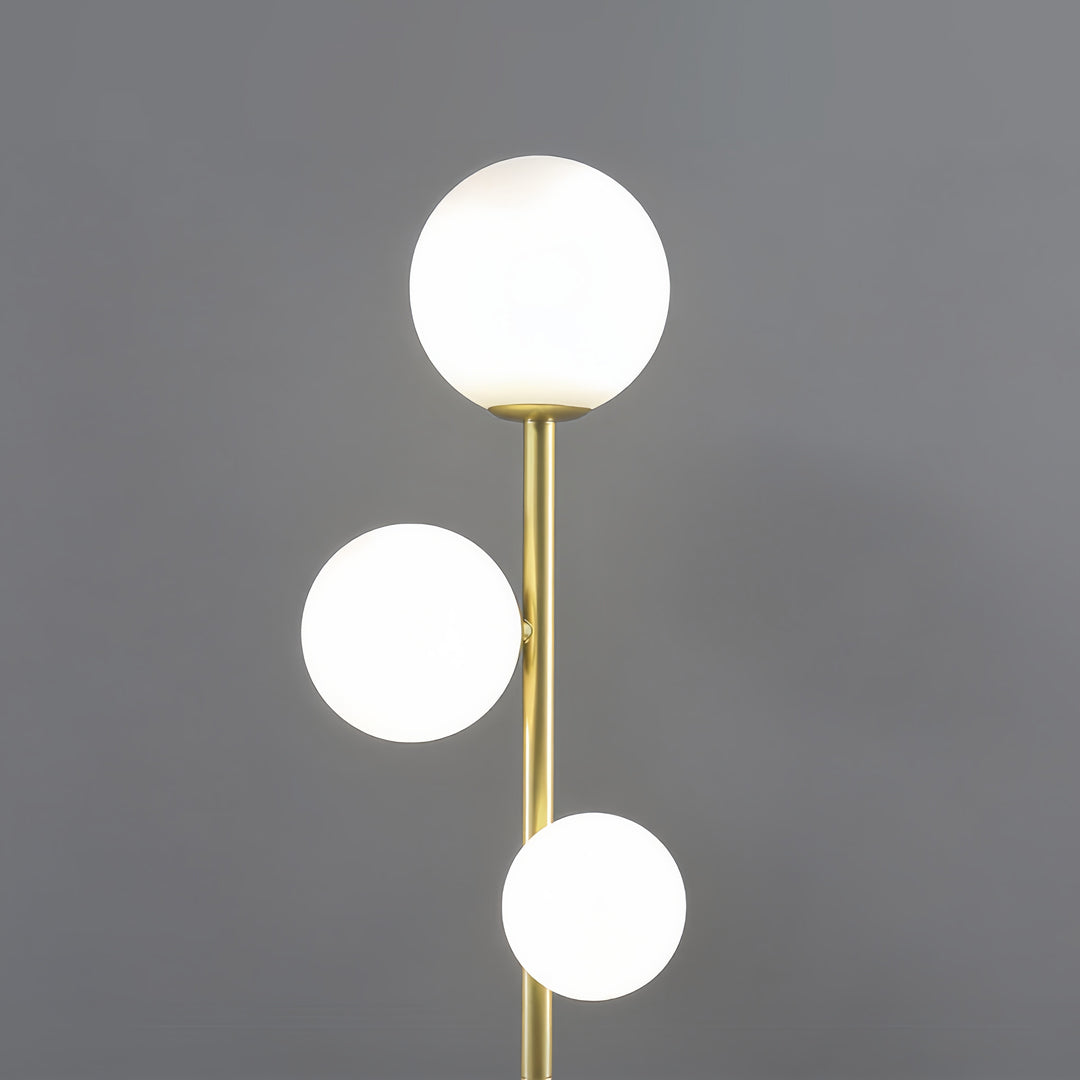 WINTHROP TRIO SPHERE FLOOR LIGHTING IN GILDED BLACK AND WHITE