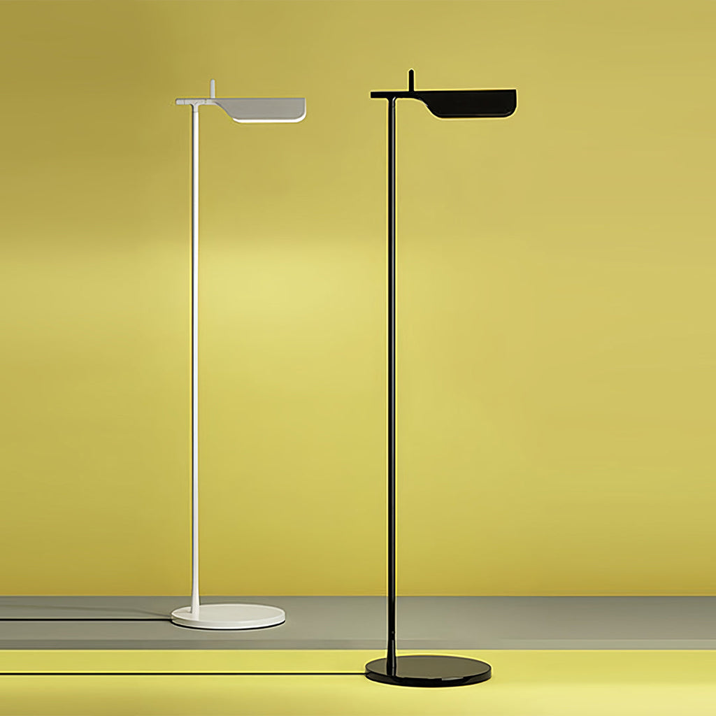 1. **LUMINAIRE VICTORIA ADJUSTABLE READING LAMP** - A sleek, dimmable LED floor lamp featuring a modern design, perfect for creating a cozy reading nook.

2. **PENROSE MODERN ILLUMINATOR** - A stylish dimmable LED floor lamp with a contemporary silhouette