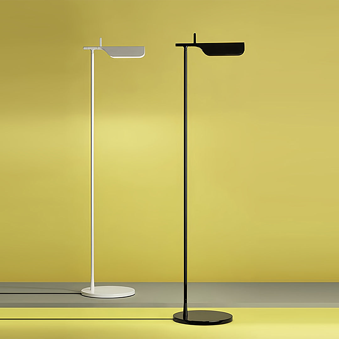 1. **LUMINAIRE VICTORIA ADJUSTABLE READING LAMP** - A sleek, dimmable LED floor lamp featuring a modern design, perfect for creating a cozy reading nook.

2. **PENROSE MODERN ILLUMINATOR** - A stylish dimmable LED floor lamp with a contemporary silhouette