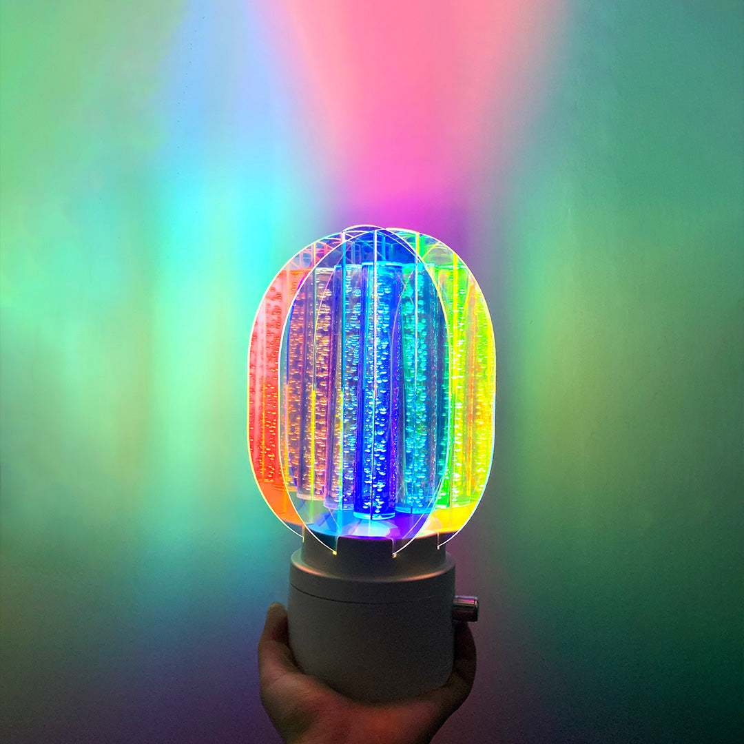 1. "VIVIENNE RAINBOW METAL TABLE LAMP"  
   A vibrant blend of colors and artistic design, this aluminum table lamp radiates warmth and creativity with its unique LED illumination.

2. "HAMPSTEAD ARTISANAL RAINBOW LAMP"  
   A striking fusion of color and