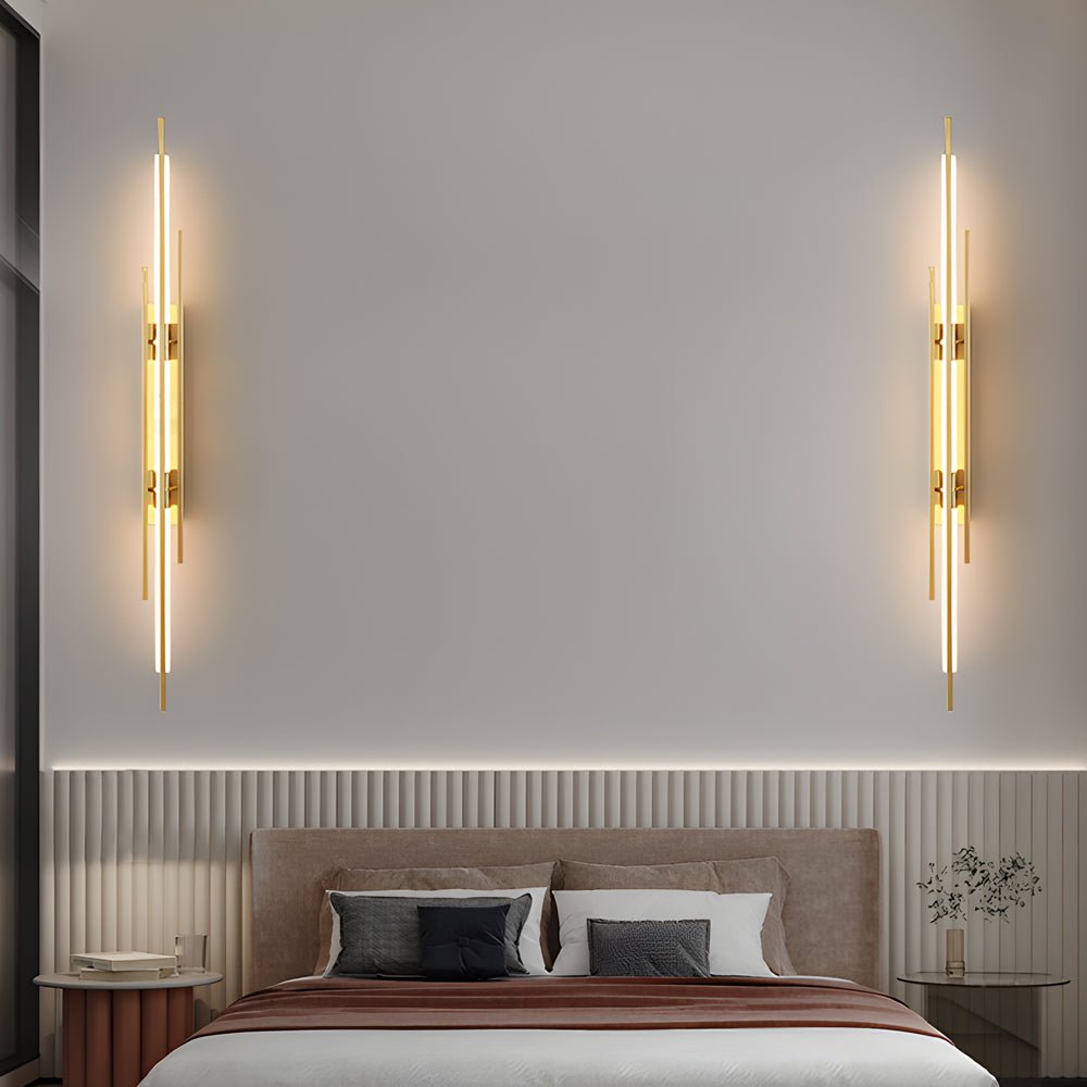 1. **WILLOUGHBY TRIO-TONE ACRYLIC WALL SCONCE**  
   A striking fusion of black, gold, and copper finishes, this modern LED wall sconce adds a contemporary flair to any space.

2. **CAVENDISH MODERNIST IRON WALL LANTERN**  
   Crafted from durable iron wi