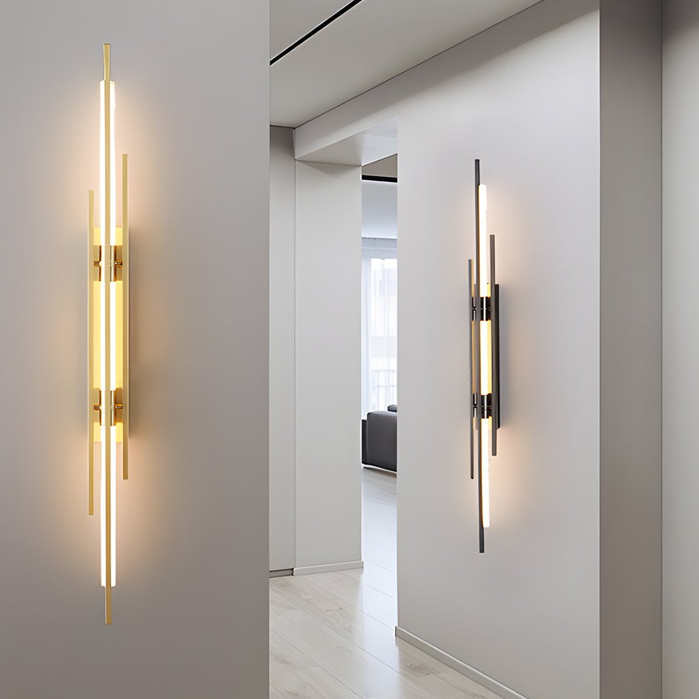 1. **WILLOUGHBY TRIO-TONE ACRYLIC WALL SCONCE**  
   A striking fusion of black, gold, and copper finishes, this modern LED wall sconce adds a contemporary flair to any space.

2. **CAVENDISH MODERNIST IRON WALL LANTERN**  
   Crafted from durable iron wi