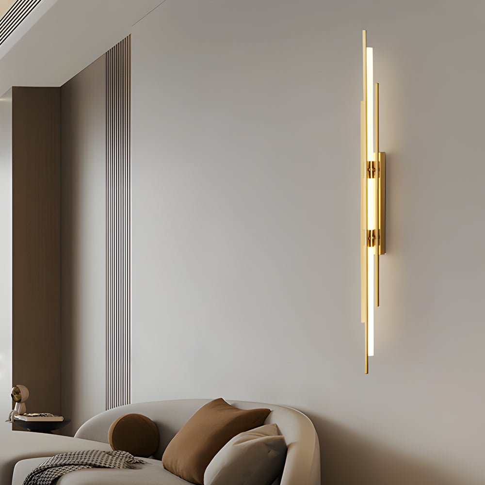 1. **WILLOUGHBY TRIO-TONE ACRYLIC WALL SCONCE**  
   A striking fusion of black, gold, and copper finishes, this modern LED wall sconce adds a contemporary flair to any space.

2. **CAVENDISH MODERNIST IRON WALL LANTERN**  
   Crafted from durable iron wi