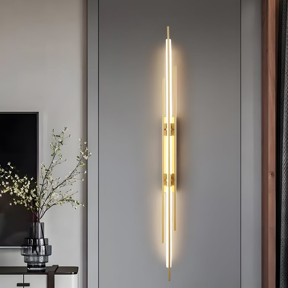 1. **WILLOUGHBY TRIO-TONE ACRYLIC WALL SCONCE**  
   A striking fusion of black, gold, and copper finishes, this modern LED wall sconce adds a contemporary flair to any space.

2. **CAVENDISH MODERNIST IRON WALL LANTERN**  
   Crafted from durable iron wi