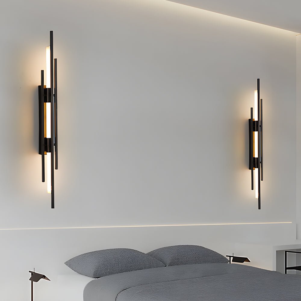 1. **WILLOUGHBY TRIO-TONE ACRYLIC WALL SCONCE**  
   A striking fusion of black, gold, and copper finishes, this modern LED wall sconce adds a contemporary flair to any space.

2. **CAVENDISH MODERNIST IRON WALL LANTERN**  
   Crafted from durable iron wi