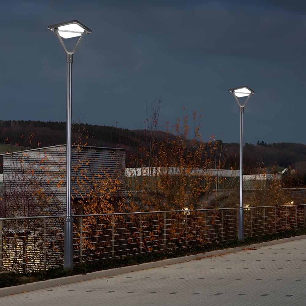 1. **WINSLOW SOLAR ILLUMINATION POST**  
   A refined solar lamp post designed to enhance outdoor spaces with a soft, ambient glow, featuring a sleek black finish and durable construction.

2. **HARTFIELD NIGHTSCAPE LANTERN**  
   This sophisticated stree