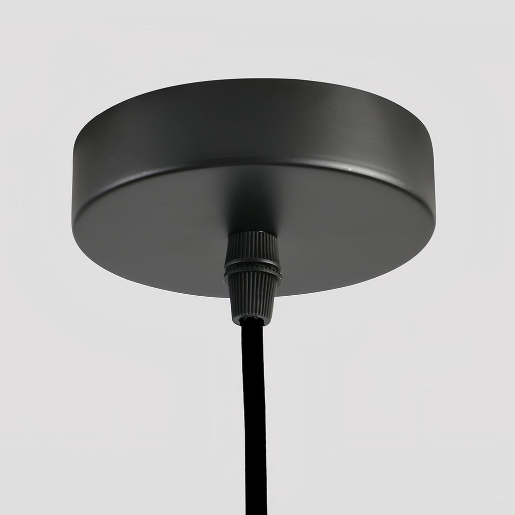 1. **MONTGOMERY FELT-ENCLOSED PENDANT LUMINAIRE**  
   A sophisticated pendant light featuring a sound-absorbing felt exterior and a robust iron frame, perfect for enhancing ambiance in any room.

2. **WINSLOW IRON & FELT HANGING ILLUMINATOR**  
   An inn