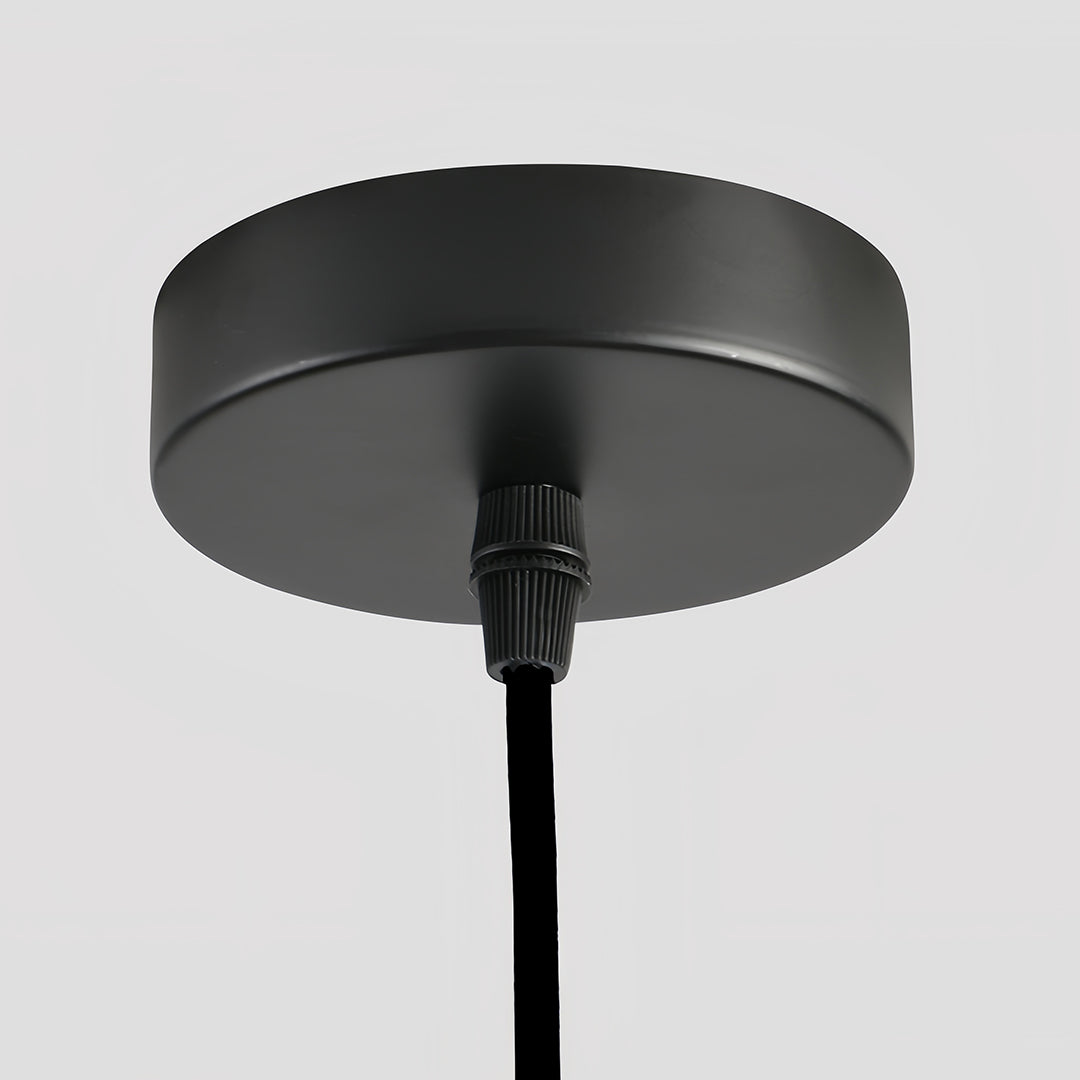 1. **MONTGOMERY FELT-ENCLOSED PENDANT LUMINAIRE**  
   A sophisticated pendant light featuring a sound-absorbing felt exterior and a robust iron frame, perfect for enhancing ambiance in any room.

2. **WINSLOW IRON & FELT HANGING ILLUMINATOR**  
   An inn