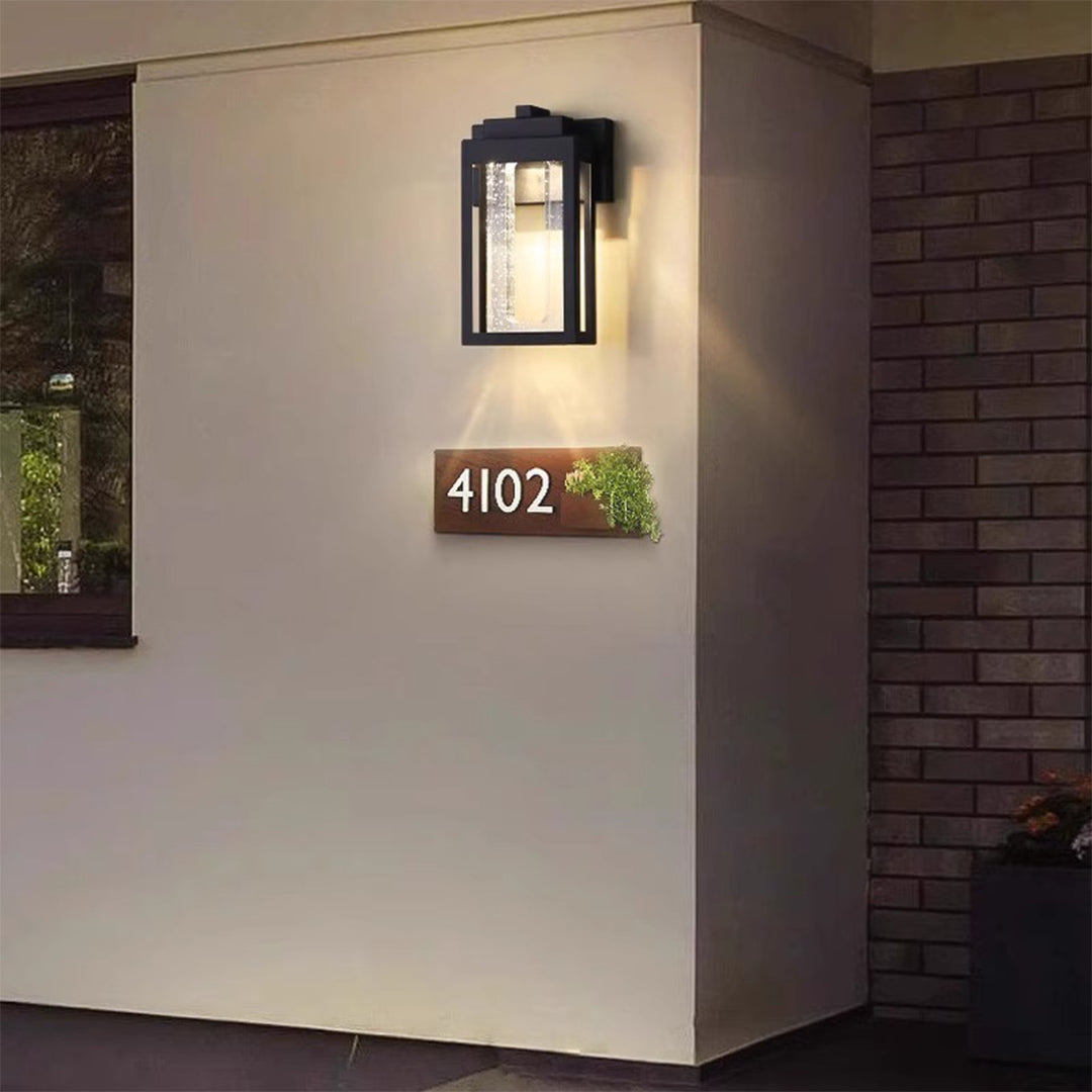 1. "WINDERMERE AQUA-BEAM OUTDOOR LANTERN"  
   - A waterproof fixture featuring a stunning crystal design that refracts light beautifully, perfect for illuminating garden paths and patios.

2. "HASTINGS CRYSTAL-CLAD WALL SCONCE"  
   - A weather-resistant