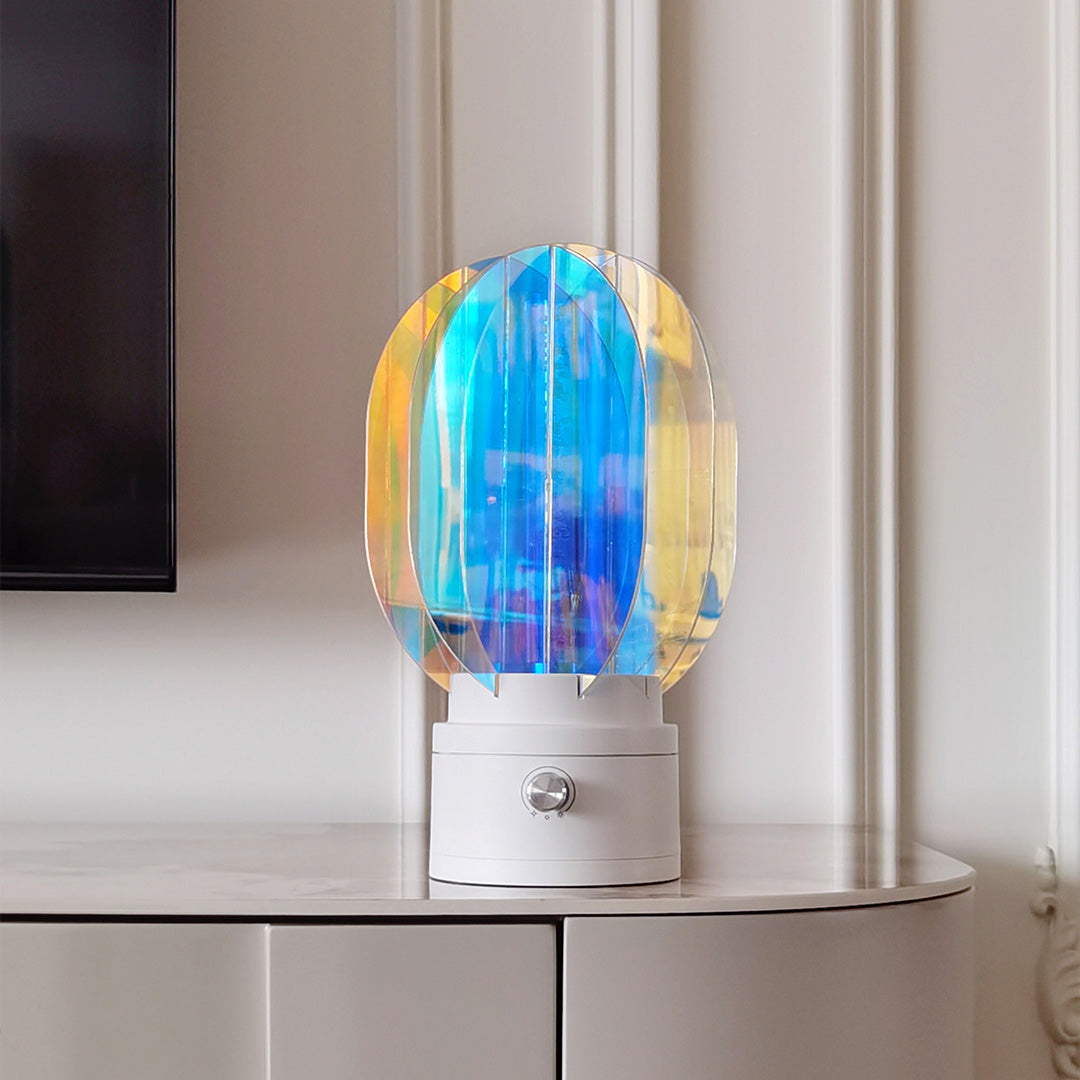 1. "VIVIENNE RAINBOW METAL TABLE LAMP"  
   A vibrant blend of colors and artistic design, this aluminum table lamp radiates warmth and creativity with its unique LED illumination.

2. "HAMPSTEAD ARTISANAL RAINBOW LAMP"  
   A striking fusion of color and