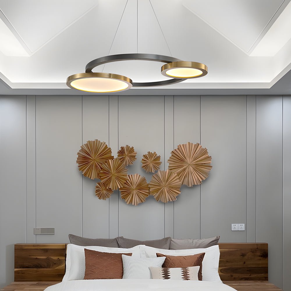 CHARLESTON PEARL BLACK AND BRASS MULTI-RING SUSPENSION CHANDELIER