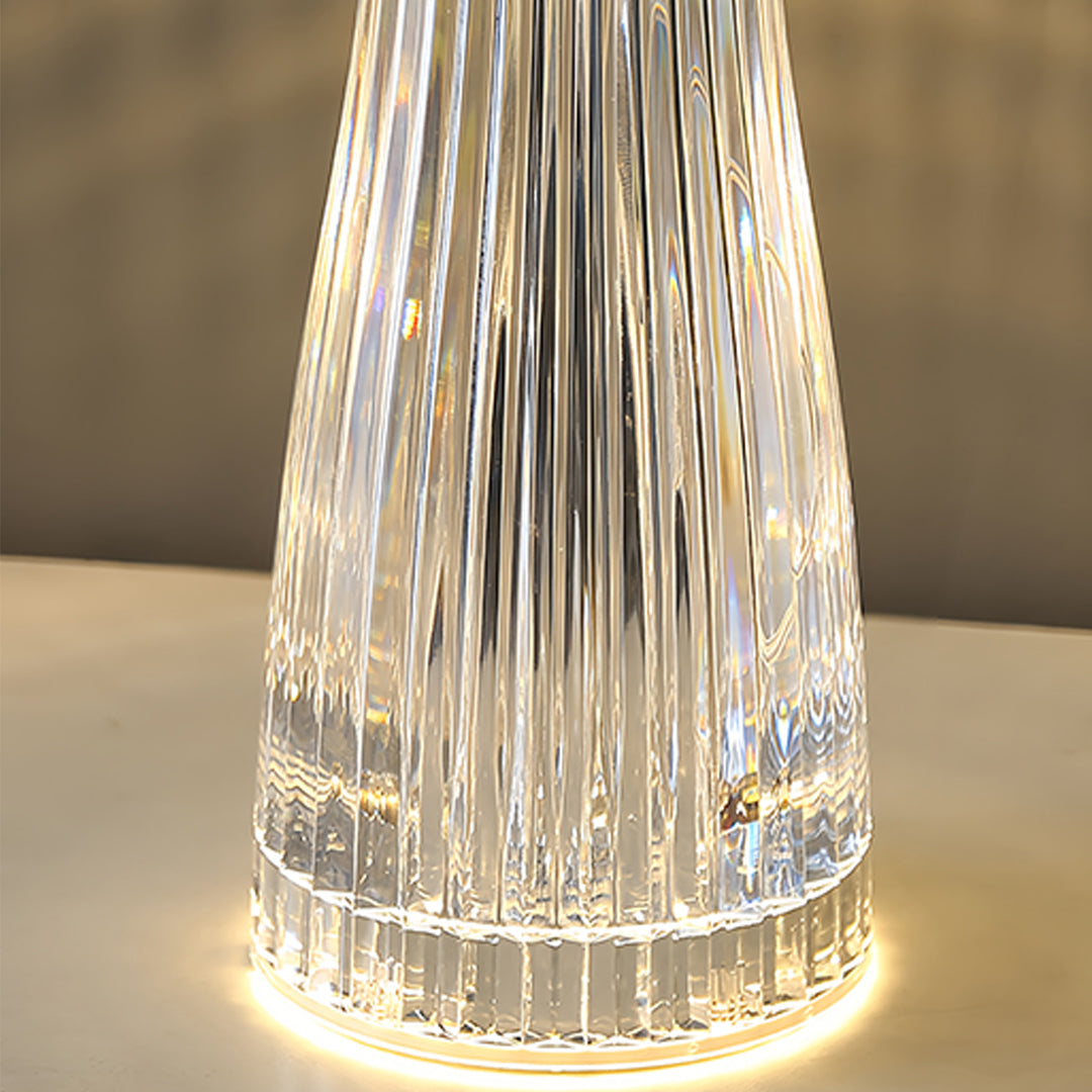 1. **WILLOUGHBY ILLUMINATED ACRYLIC TABLE LAMP**  
   A strikingly clear lamp that combines modern design with portability, perfect for adding a luminous touch to any space.

2. **FENWICK TRANSLUCENT ACRYLIC LAMP**  
   This portable lamp showcases a slee
