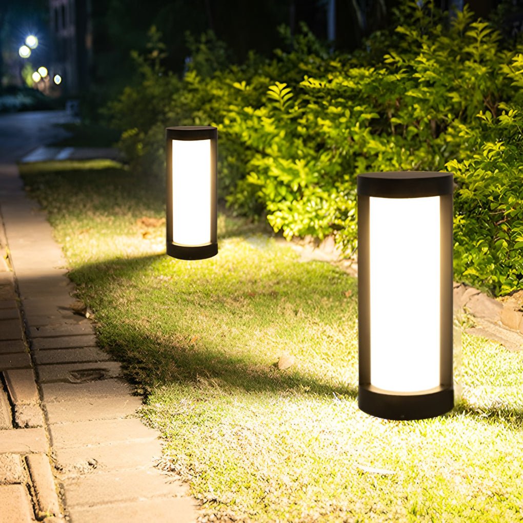 1. **SOMERSET SOLAR GLOW PATHWAY BOLLARD** - A striking black cylindrical light that combines solar and wired functionality for illuminating outdoor pathways with sophistication.

2. **WILLOUGHBY NIGHTSCAPE BOLLARD LAMP** - A refined black LED bollard des