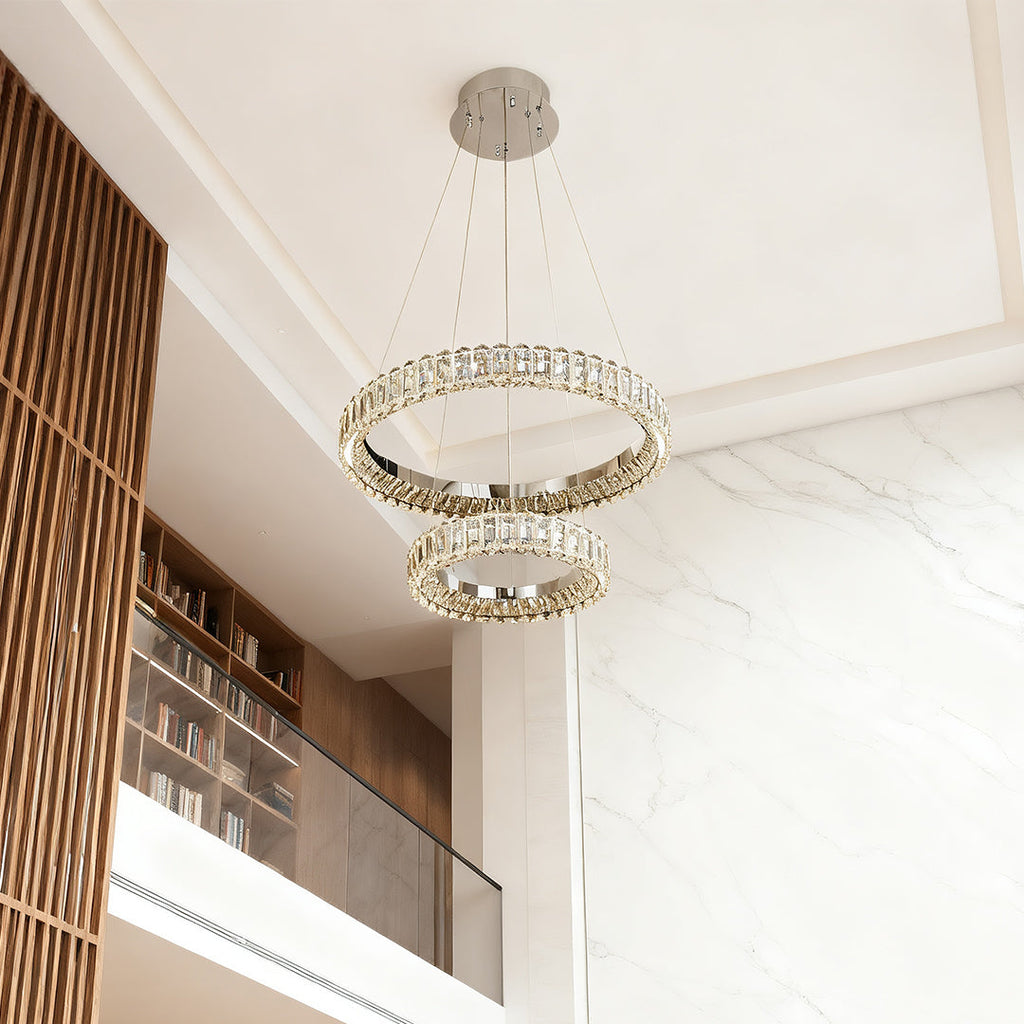 "HALCYON RINGED CEILING LUMINAIRE"  
This sophisticated fixture features a sleek, circular design that embodies minimalist luxury, casting a warm glow while enhancing the ambiance of any space.