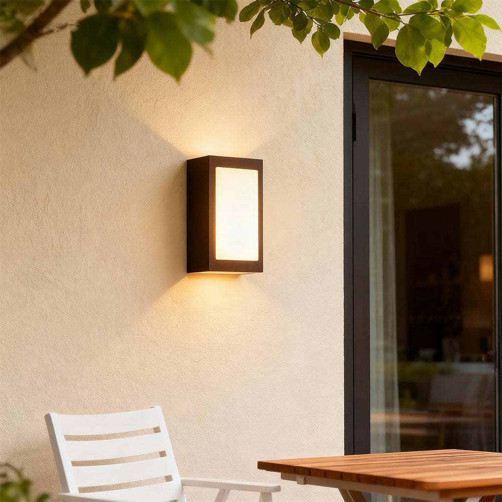 RAVENHALL MINIMALIST BLACK WALL SCONCE WITH WEATHER-RESISTANT DESIGN