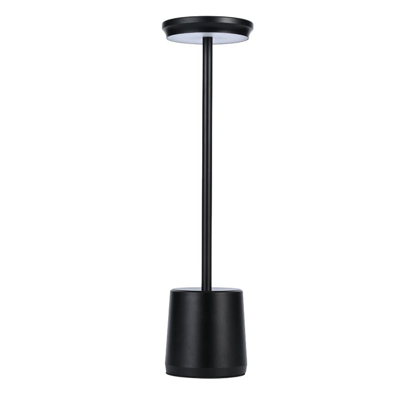 "WINTHORPE WIRELESS ILLUMINATION TABLE LAMP" 

This sophisticated lamp features a rechargeable LED design, providing versatile ambient lighting without the constraints of cords. Its modern aesthetic is perfect for any setting, seamlessly blending function