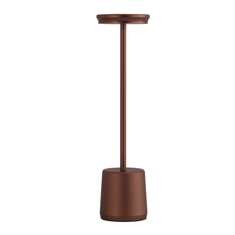 "WINTHORPE WIRELESS ILLUMINATION TABLE LAMP" 

This sophisticated lamp features a rechargeable LED design, providing versatile ambient lighting without the constraints of cords. Its modern aesthetic is perfect for any setting, seamlessly blending function