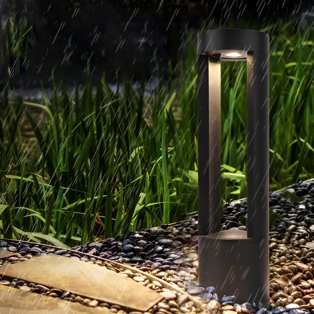 WINTHORPE AQUA GUARDIAN OUTDOOR BOLLARD LANTERN, HOLLOW CYLINDRICAL BLACK DESIGN FOR STYLISH EXTERIOR ILLUMINATION
