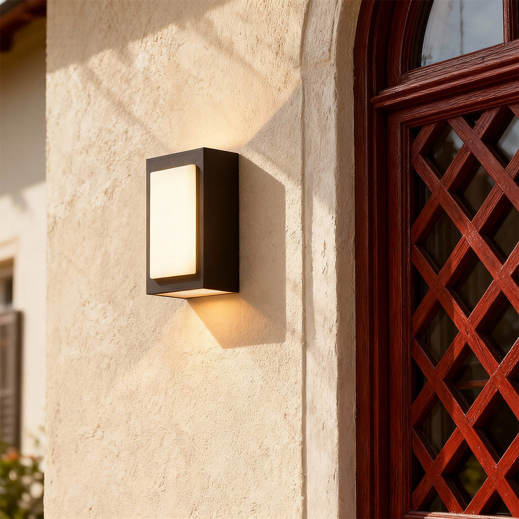 RAVENHALL MINIMALIST BLACK WALL SCONCE WITH WEATHER-RESISTANT DESIGN