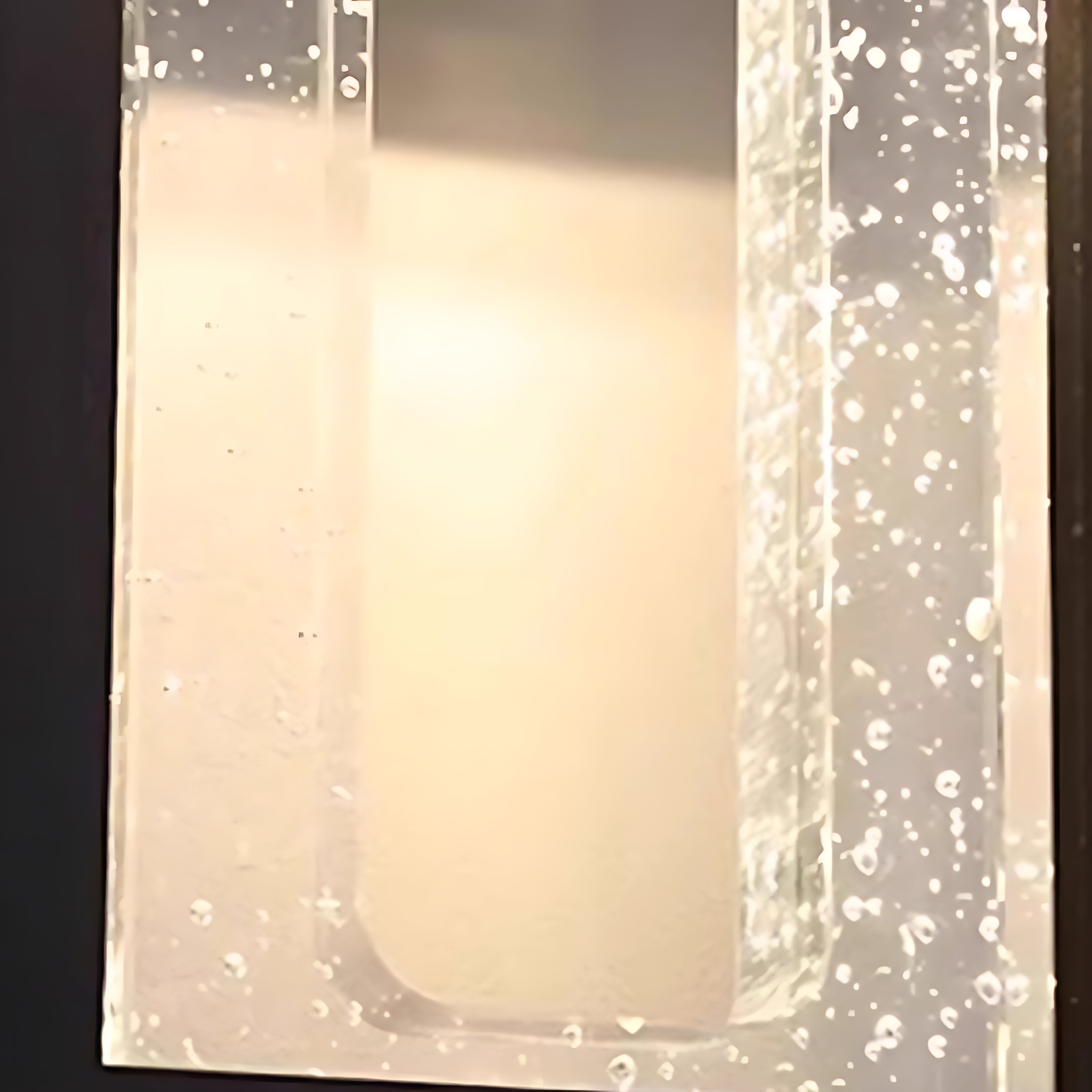 1. "WINDERMERE AQUA-BEAM OUTDOOR LANTERN"  
   - A waterproof fixture featuring a stunning crystal design that refracts light beautifully, perfect for illuminating garden paths and patios.

2. "HASTINGS CRYSTAL-CLAD WALL SCONCE"  
   - A weather-resistant