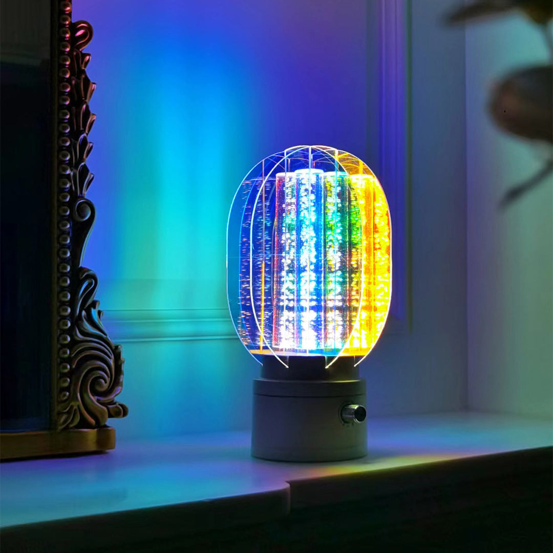 1. "VIVIENNE RAINBOW METAL TABLE LAMP"  
   A vibrant blend of colors and artistic design, this aluminum table lamp radiates warmth and creativity with its unique LED illumination.

2. "HAMPSTEAD ARTISANAL RAINBOW LAMP"  
   A striking fusion of color and